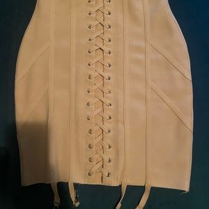 Corset detailing, stocking connecter. Very edgy, but settle.